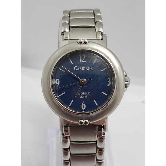 Women s Carriage by Timex watch. Indiglo. Dark blue face. Silver band. Accessories